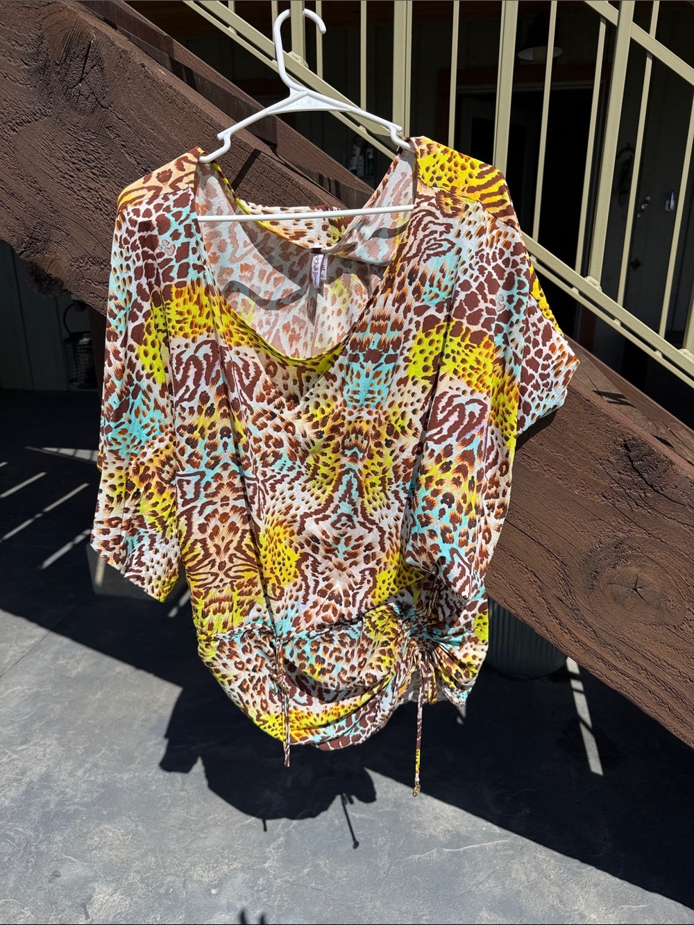 Luli Fama size MED.  Women’s  Multicolor Animal Print Short Sleeve cover up.
